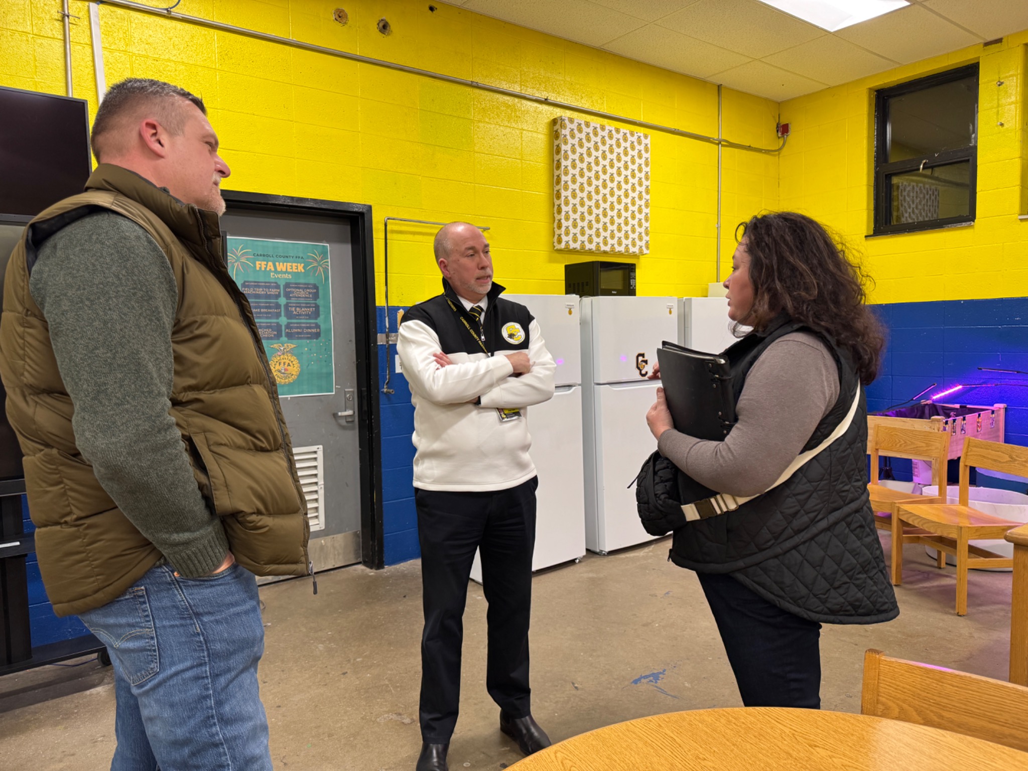 Casey Jaynes listening to community members following a presentation